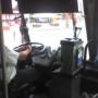 The bus driver taking me downtown.
